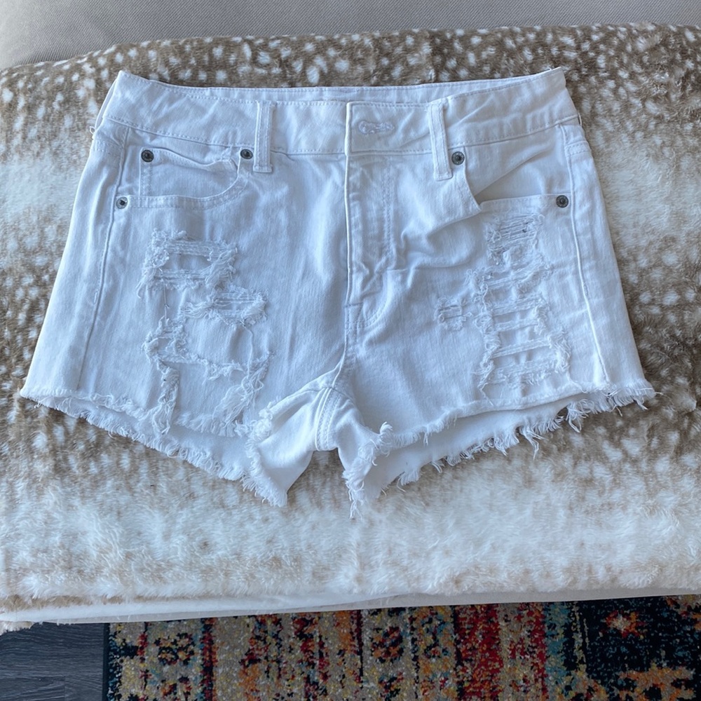 AE white distressed shorts